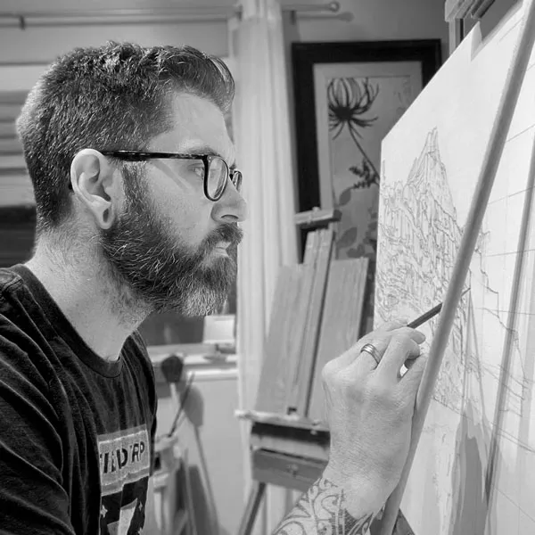 Nate Baldwin drawing in the studio